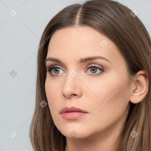 Neutral white young-adult female with long  brown hair and brown eyes