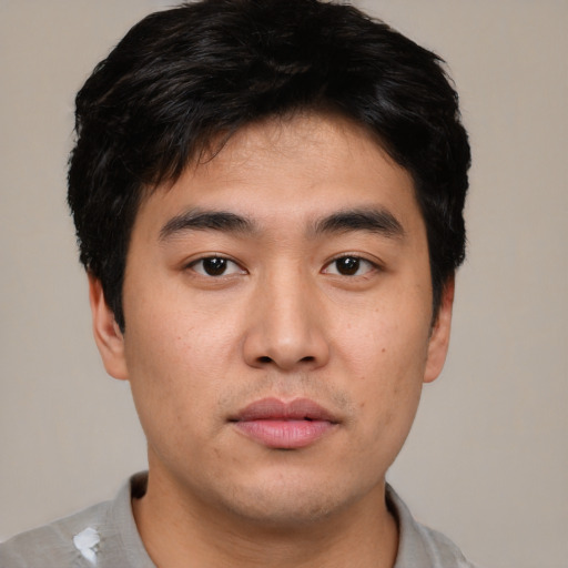 Neutral asian young-adult male with short  black hair and brown eyes