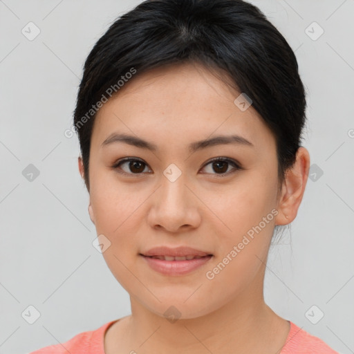 Joyful asian young-adult female with short  brown hair and brown eyes