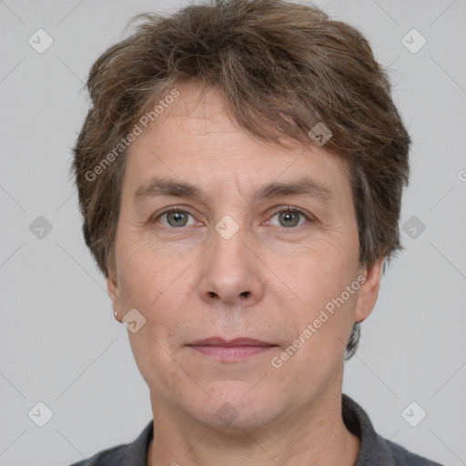 Joyful white adult male with short  brown hair and grey eyes