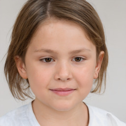 Joyful white child female with medium  brown hair and brown eyes