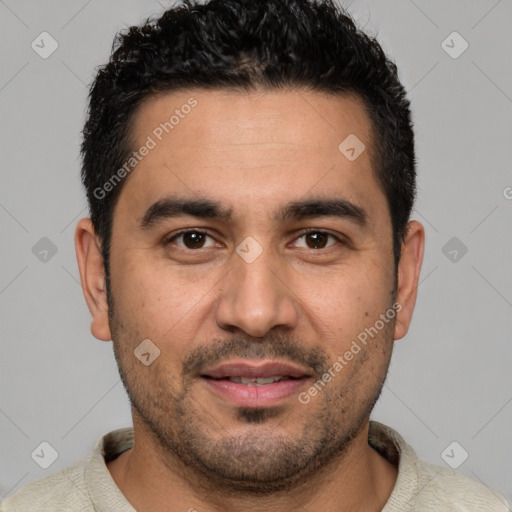 Joyful white young-adult male with short  black hair and brown eyes