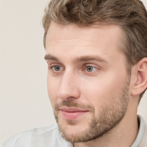 Neutral white young-adult male with short  brown hair and grey eyes