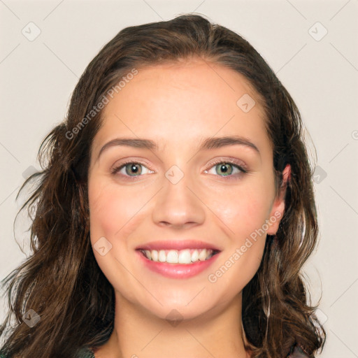 Joyful white young-adult female with long  brown hair and green eyes