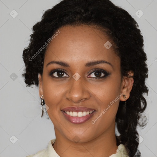 Joyful black young-adult female with medium  brown hair and brown eyes