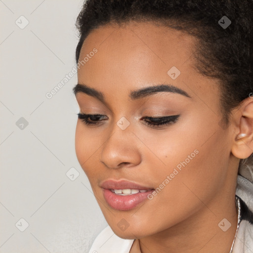 Joyful latino young-adult female with short  brown hair and brown eyes