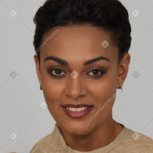 Joyful black young-adult female with short  black hair and brown eyes