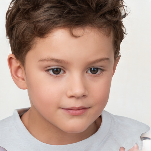 Joyful white child male with short  brown hair and brown eyes