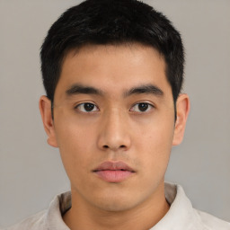 Neutral asian young-adult male with short  brown hair and brown eyes