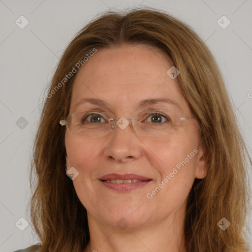 Joyful white adult female with long  brown hair and brown eyes