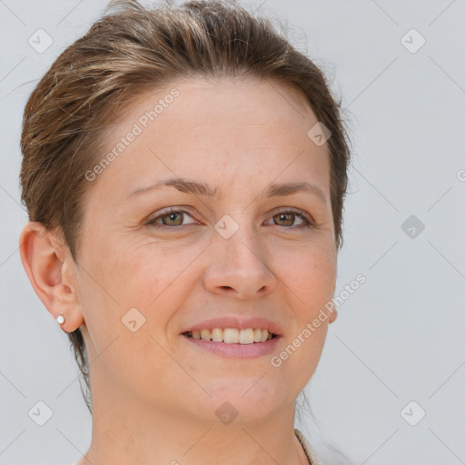 Joyful white young-adult female with short  brown hair and brown eyes