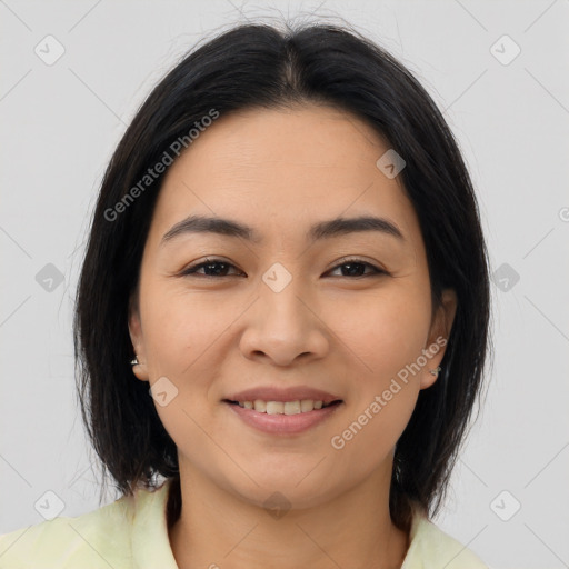 Joyful asian young-adult female with medium  brown hair and brown eyes