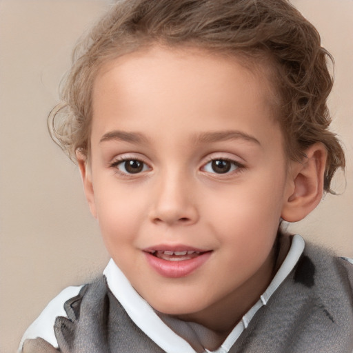 Joyful white child female with short  brown hair and brown eyes