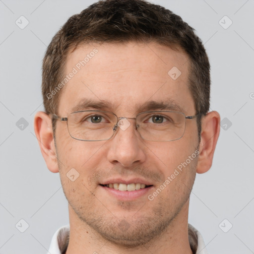 Joyful white adult male with short  brown hair and brown eyes