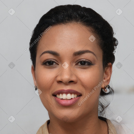 Joyful latino young-adult female with short  black hair and brown eyes