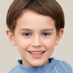 Joyful white child male with short  brown hair and brown eyes