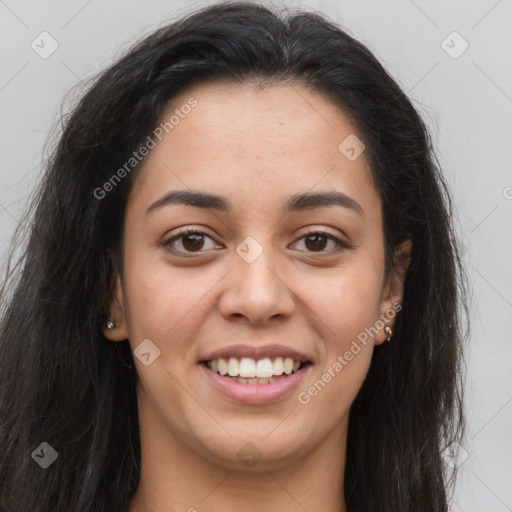 Joyful latino young-adult female with long  brown hair and brown eyes