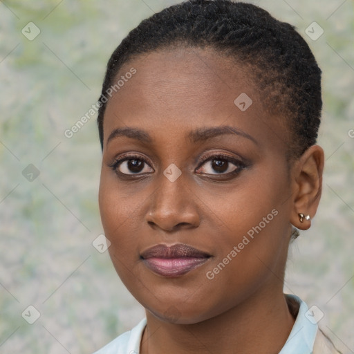 Joyful black young-adult female with short  brown hair and brown eyes