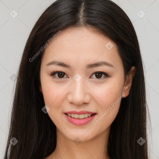 Joyful asian young-adult female with long  brown hair and brown eyes