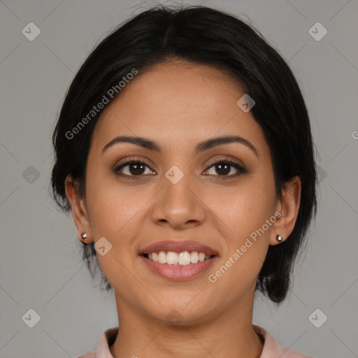 Joyful latino young-adult female with medium  brown hair and brown eyes