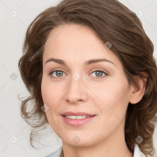 Joyful white young-adult female with medium  brown hair and green eyes