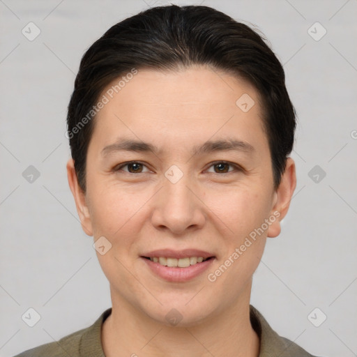 Joyful white young-adult female with short  brown hair and brown eyes