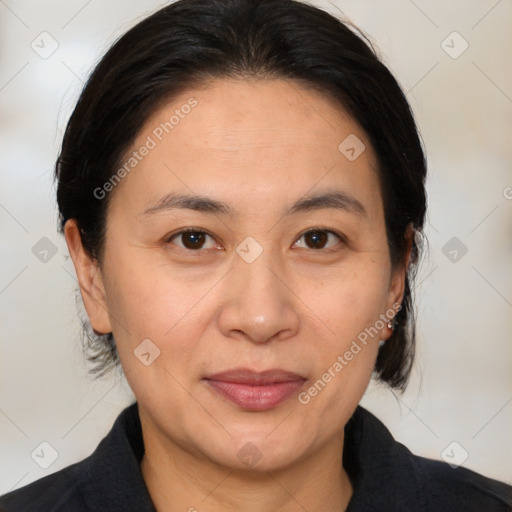 Joyful white adult female with medium  brown hair and brown eyes