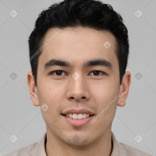 Joyful latino young-adult male with short  brown hair and brown eyes