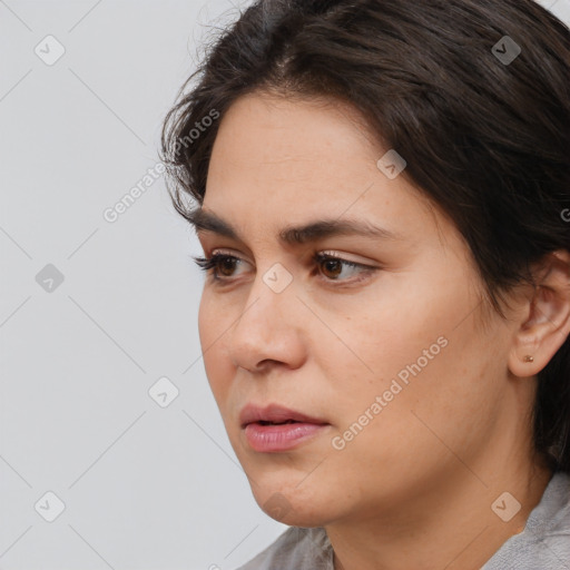 Neutral white young-adult female with medium  brown hair and brown eyes