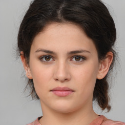 Neutral white young-adult female with medium  brown hair and brown eyes