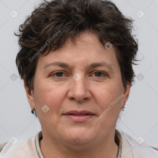 Joyful white adult female with short  brown hair and brown eyes