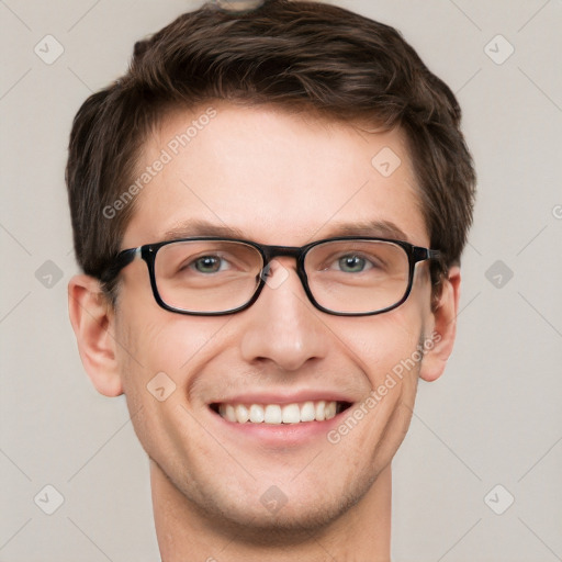 Joyful white adult male with short  brown hair and grey eyes