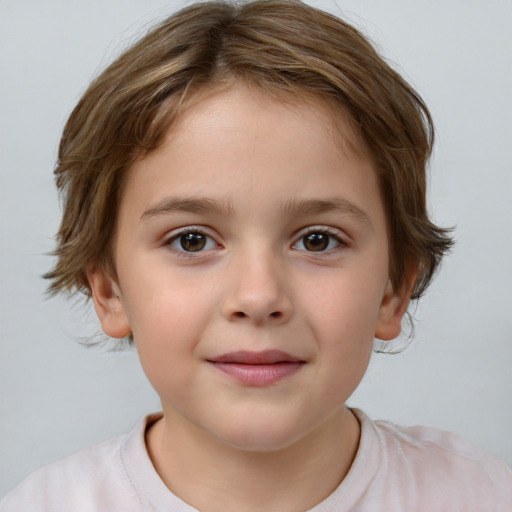 Joyful white child female with short  brown hair and brown eyes