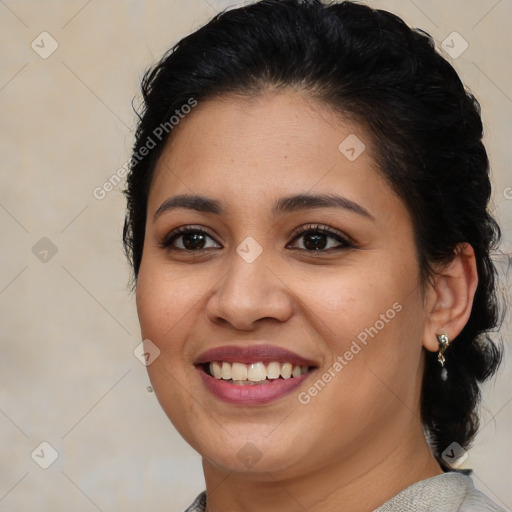 Joyful latino young-adult female with medium  brown hair and brown eyes