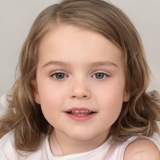 Joyful white child female with medium  brown hair and brown eyes