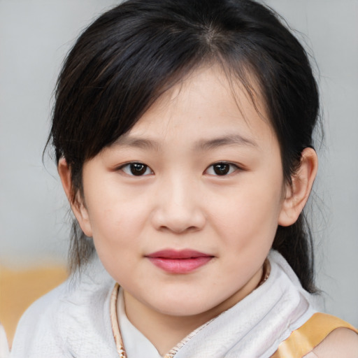 Joyful asian child female with medium  brown hair and brown eyes