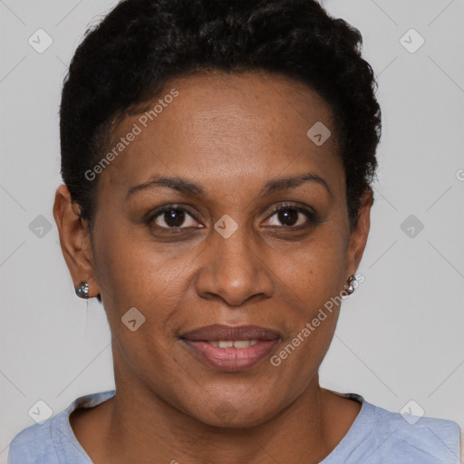 Joyful black adult female with short  brown hair and brown eyes