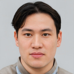 Neutral asian young-adult male with short  brown hair and brown eyes