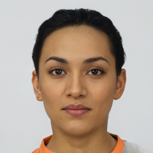 Neutral latino young-adult female with short  black hair and brown eyes