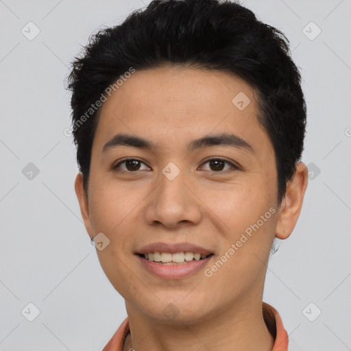 Joyful asian young-adult male with short  black hair and brown eyes