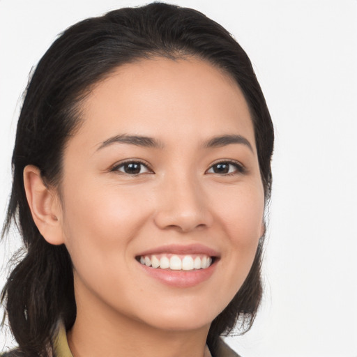 Joyful white young-adult female with long  black hair and brown eyes