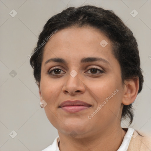 Joyful latino young-adult female with short  brown hair and brown eyes