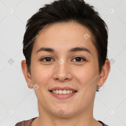 Joyful white young-adult female with short  brown hair and brown eyes