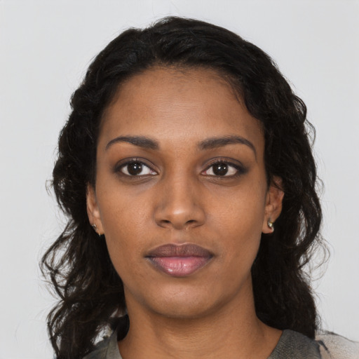 Neutral black young-adult female with long  black hair and brown eyes