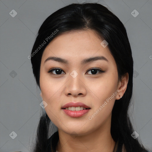 Joyful asian young-adult female with medium  black hair and brown eyes