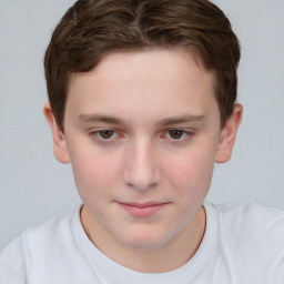 Joyful white child female with short  brown hair and brown eyes