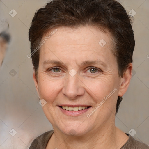 Joyful white adult female with short  brown hair and brown eyes