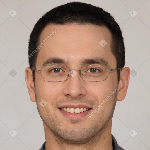 Joyful white adult male with short  brown hair and brown eyes