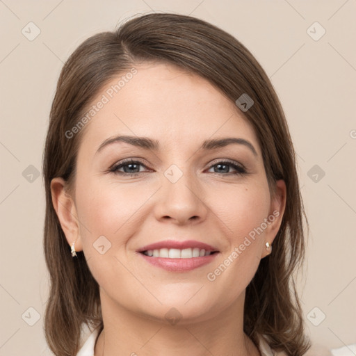 Joyful white young-adult female with medium  brown hair and grey eyes