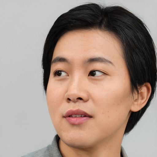 Neutral asian young-adult male with medium  black hair and brown eyes